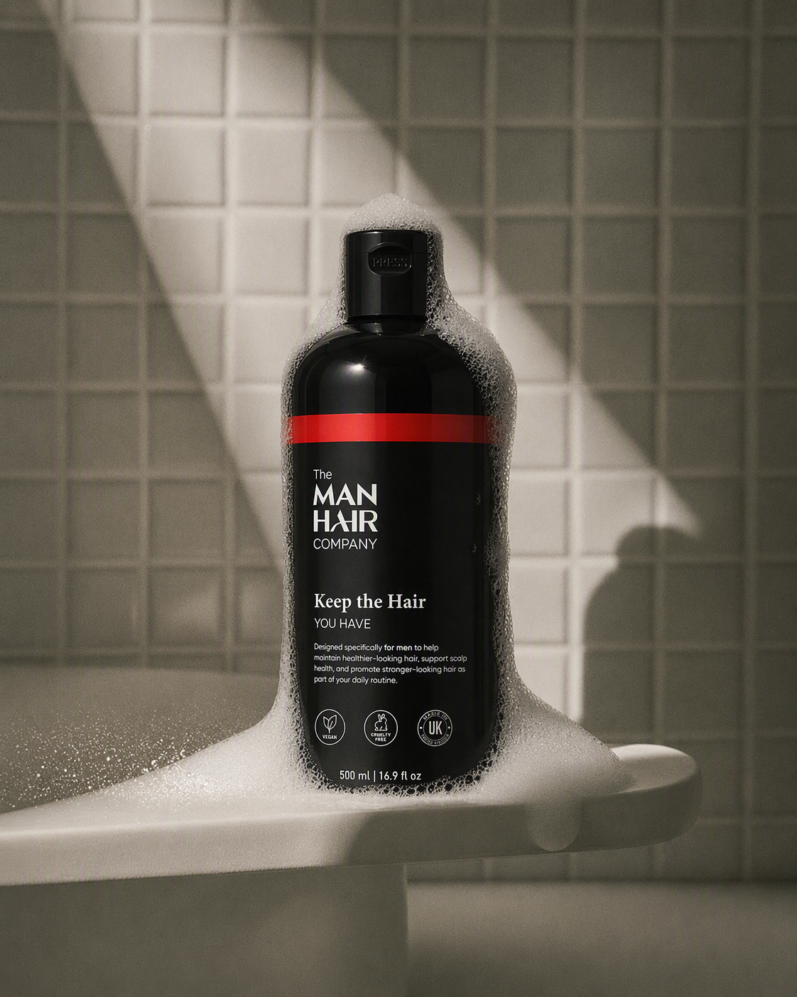 The Man Hair anti-dandruff shampoo for men — 250ml bottle on a modern bathroom counter